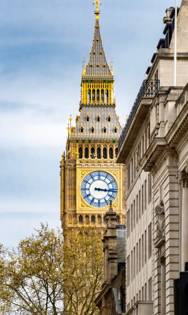 Big Ben in London, a renowned UK landmark, against a clear sky.